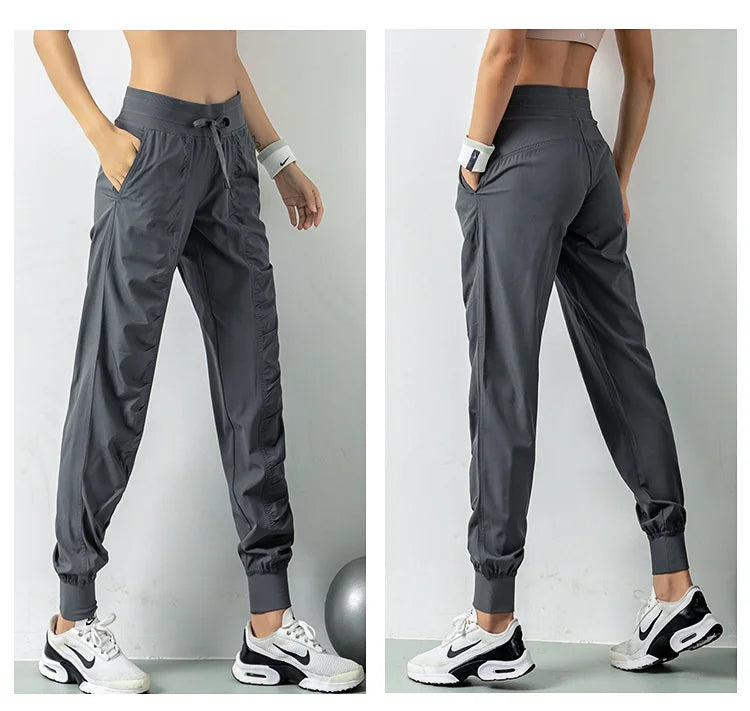 Pantalones deportivos de secado rápido para mujer con dos bolsillos laterales